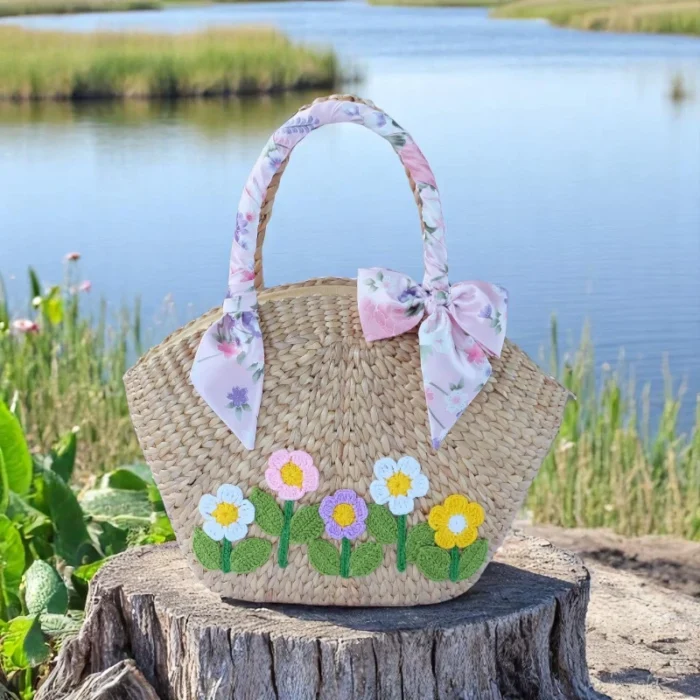 Lalita Eco-Friendly Straw Tote with Floral Embroidery – handmade natural straw bag with floral detail and curved handles