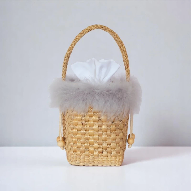 Nathamon Soft Trimmed Mini Straw Drawstring Bag with Misty Grey Feather Detail