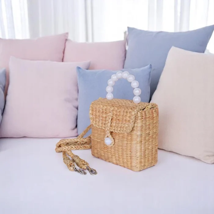 Straw box purse with pearl handle and crossbody strap