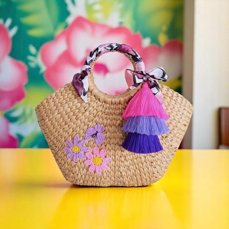 Chalisa handmade straw bag with tassels and crochet flowers